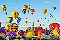 A crowd inflating air balloons during International Hot Air Balloon Fiesta, Albuquerque, New Mexico, USA. Editorial credit: Wirestock Creators / Shutterstock.com