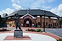 The Sandlot Kid statue at the entrance to Doubleday Field. Editorial credit: Steve Cukrov / Shutterstock.com