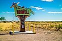 Roswell, NM: A welcoming signboard at the entry point of the town. Editorial credit: Cheri Alguire / Shutterstock.com