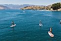 Lake Chelan, Washington with a group of people paddle boarding