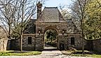 The stone gatehouse to the entrance to Frick Park, Pittsburgh. Editorial credit: woodsnorthphoto / Shutterstock.com