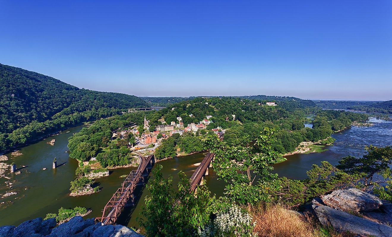 View over historical civil war town of Harpers Ferry, a National Park owned town, by the confluence of the Potomac and Shenandoah rivers