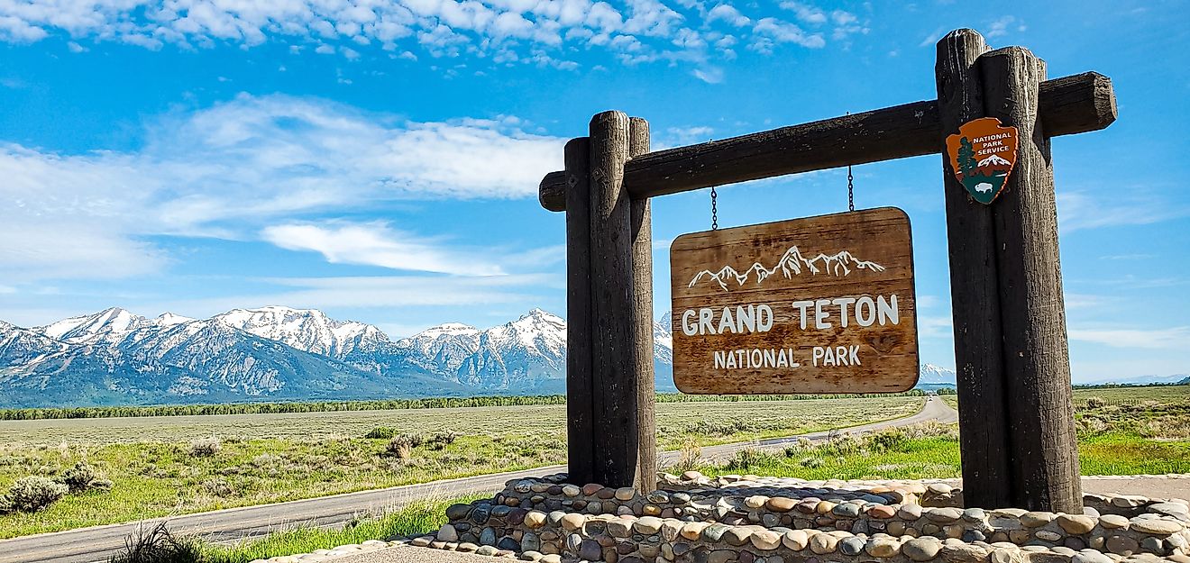 grand Teton national Park sign and background with grand Tetons