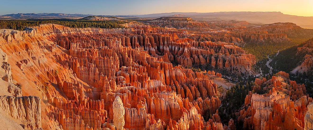 Inspiration Point during beautiful sunrise, with hoodoos - unique rock formations from sandstone made by geological erosion. Bryce National Park, Utah, USA