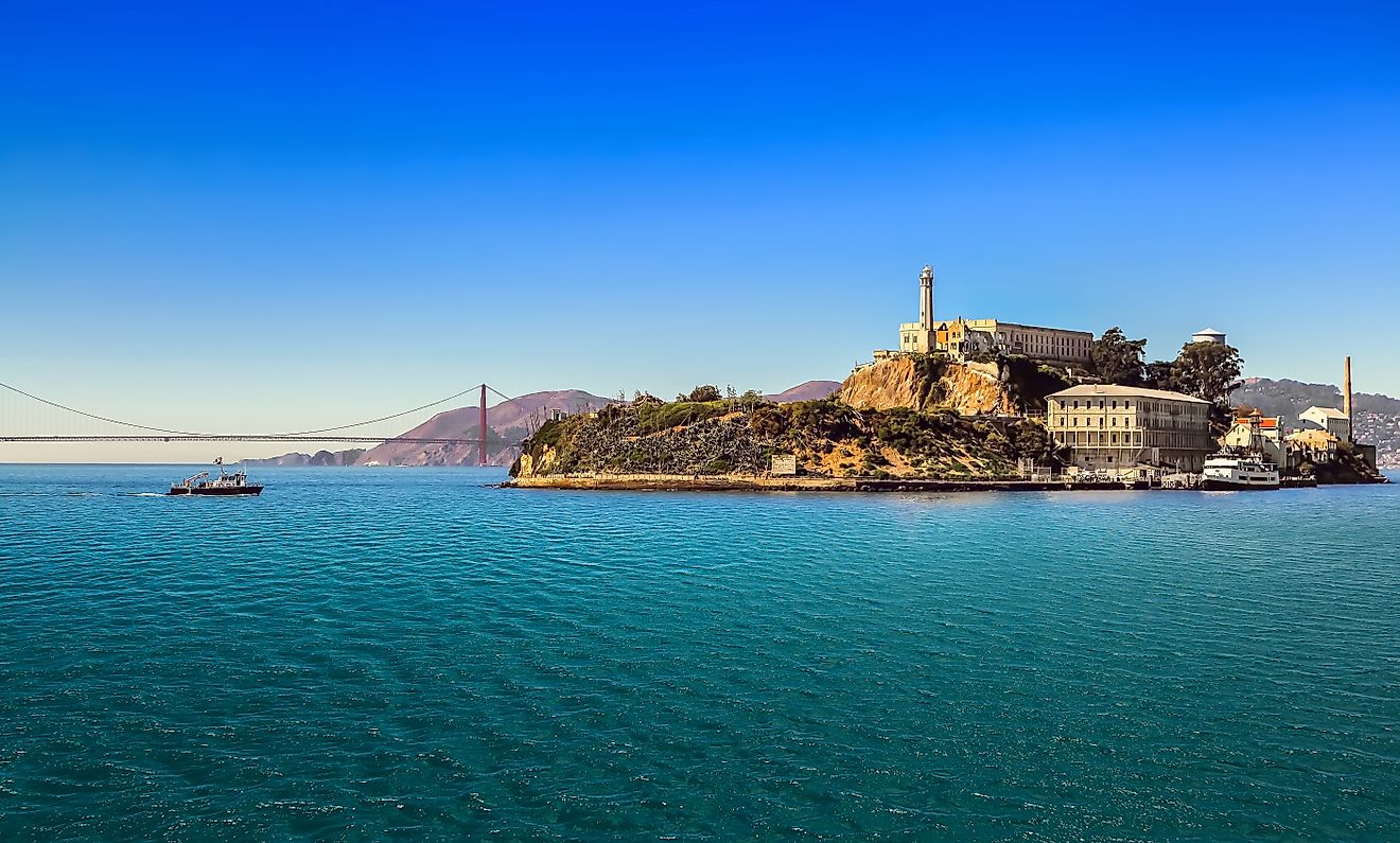 San Francisco bay with Alcatraz Island and Golden Gate Bridge on sunny day 