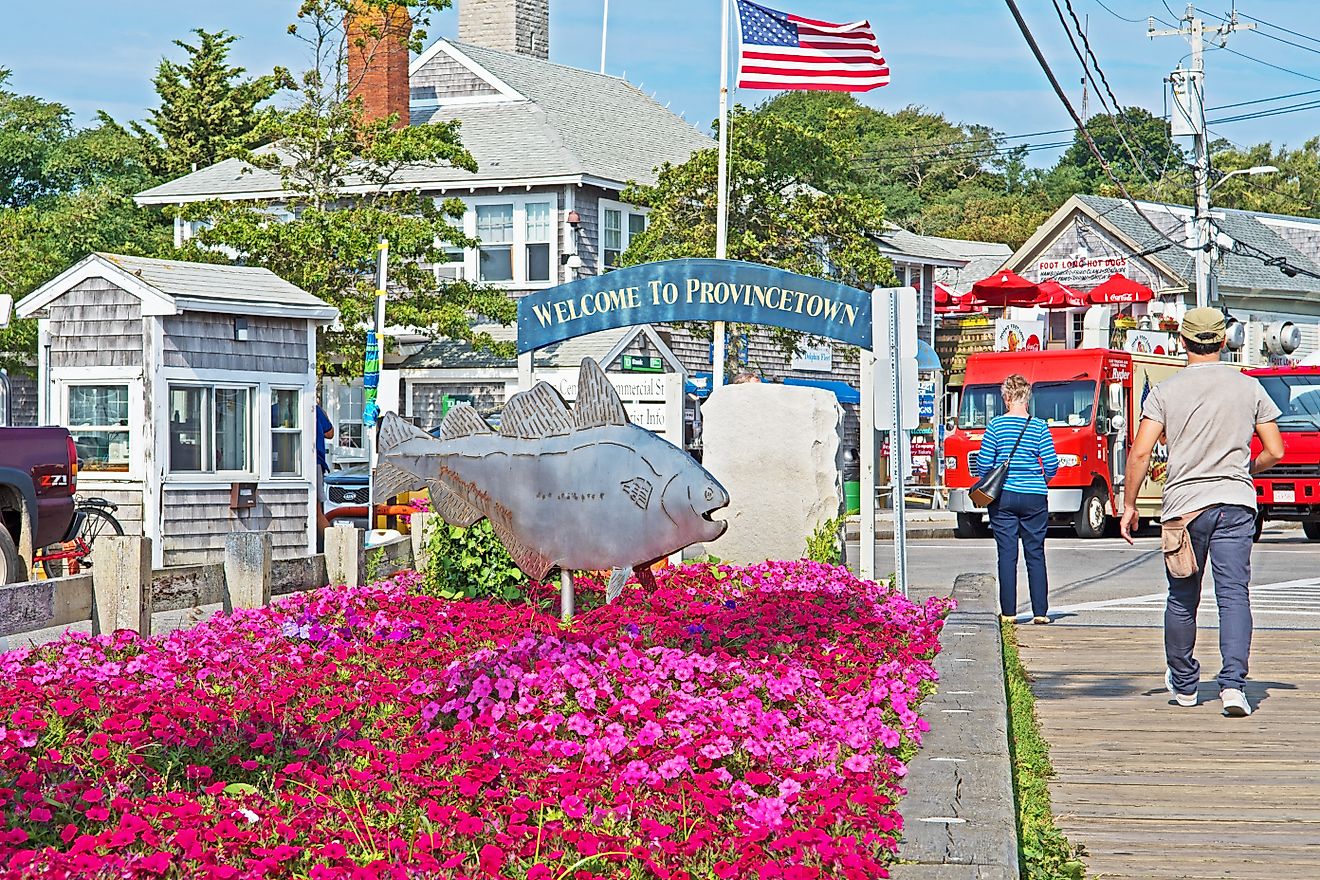  Entry to the Macmillan Wharf, a sign welcomes visitors to Provincetown. Editorial credit: Mystic Stock Photography / Shutterstock.com