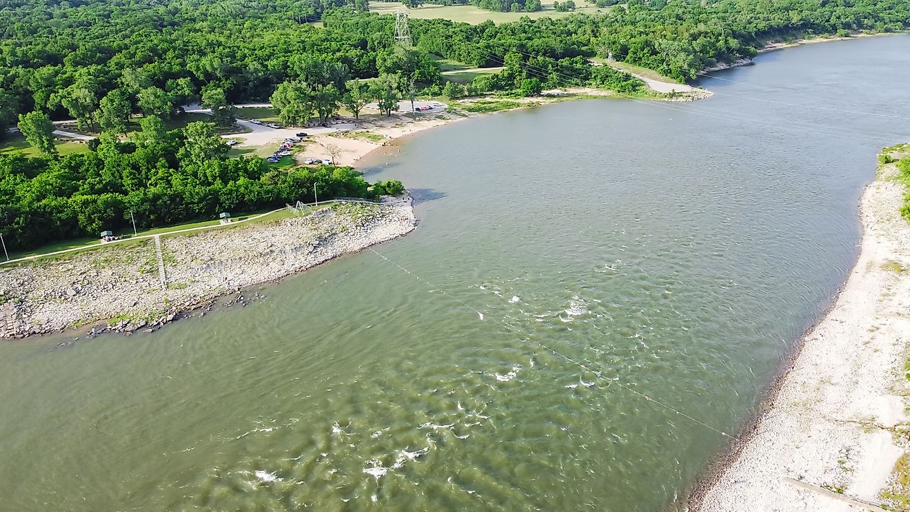 Top view Oklahoma side of Red River with strong water current generating from Denison Dam