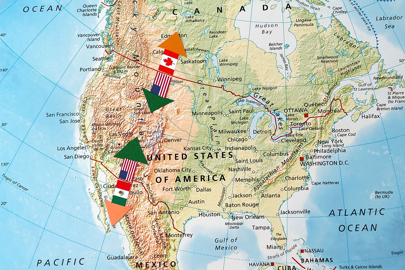 The border between the USA - Mexico and USA - Canada , accompanied by the flags of each countries
