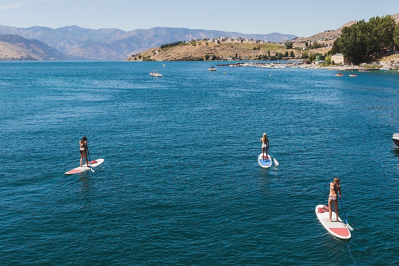 Lake Chelan, Washington with a group of people paddle boarding
