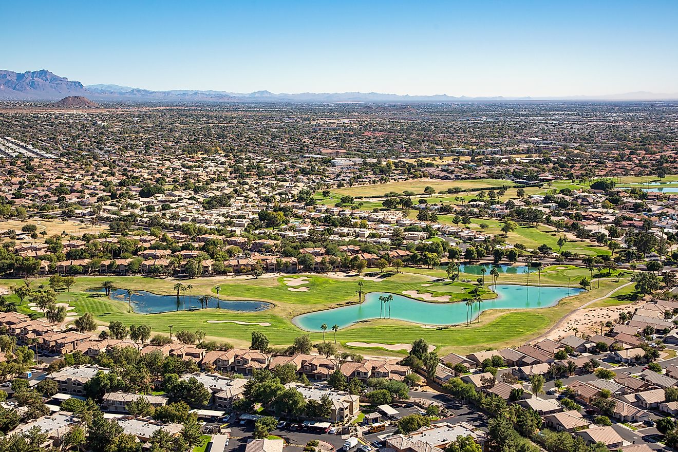 Aerial view of a mature golf course in an upscale community in east Mesa, Arizona