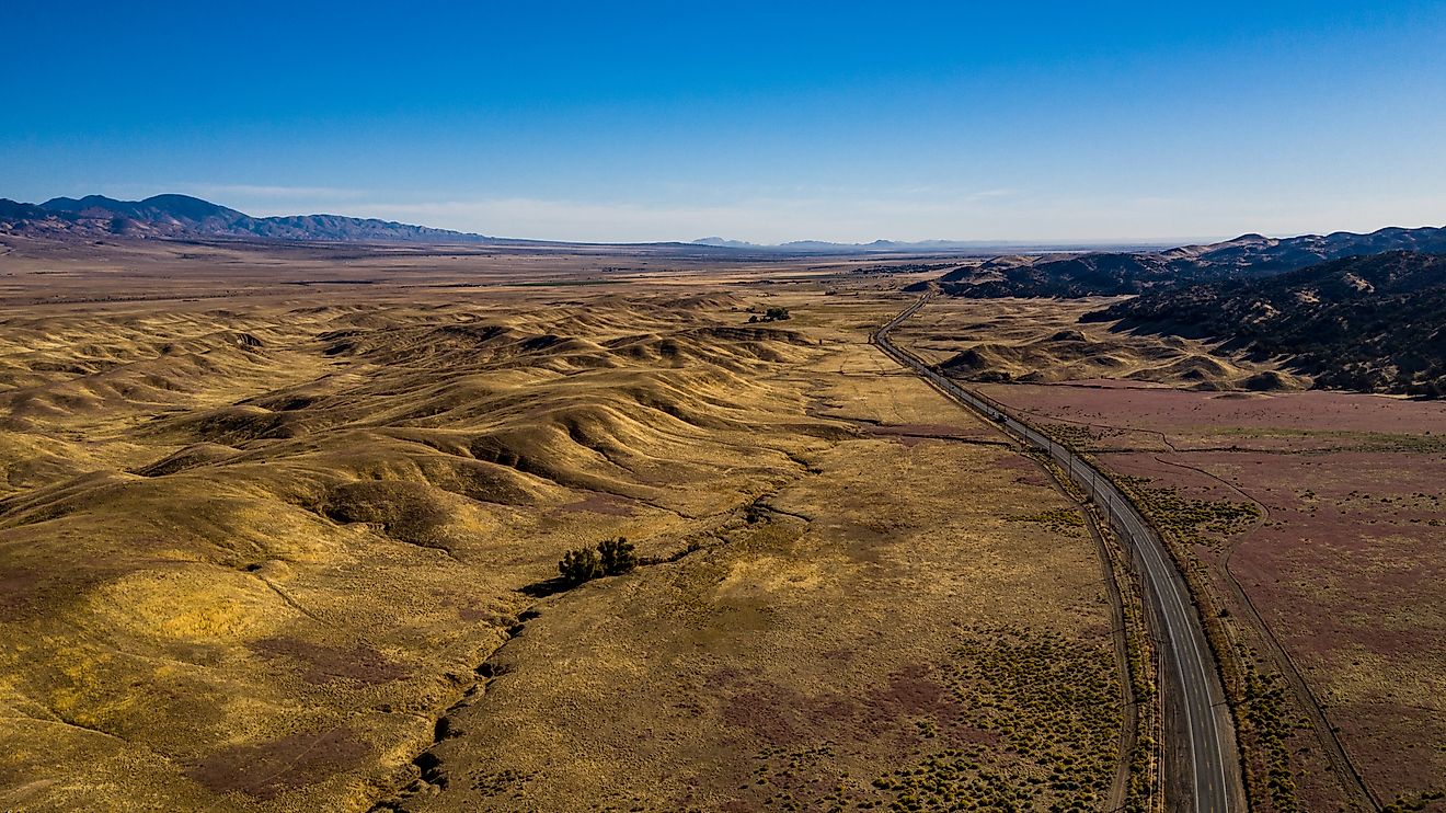 Aerial view of the golden hills along California Highway 138 near Quail Lake and San Andreas Fault 
