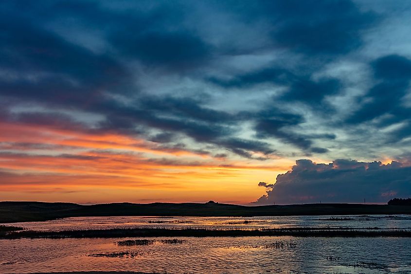 Sunrise clouds over wetlands at Valentine National Wildlife Refuge in Valentine, Nebraska