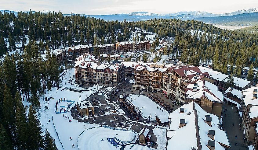 Aerial photo taken with drone of Northstar Resort, Lake Tahoe CA, USA, West Coast, wintertime after a heavy snow, with the lake in the background