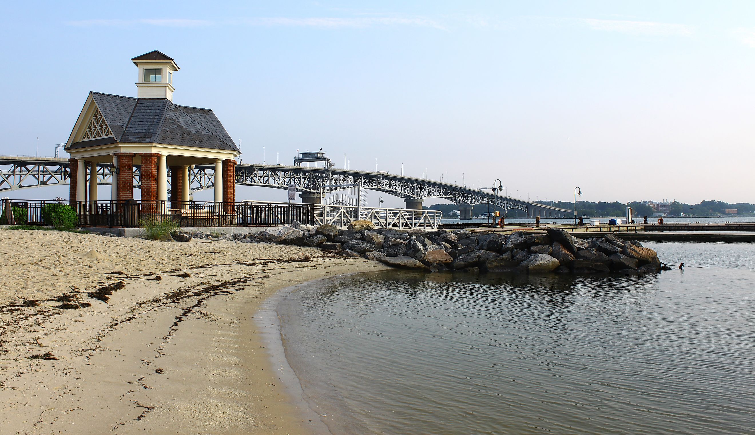 The Yorktown beach and waterfront with the Coleman bridge and a small gazebo