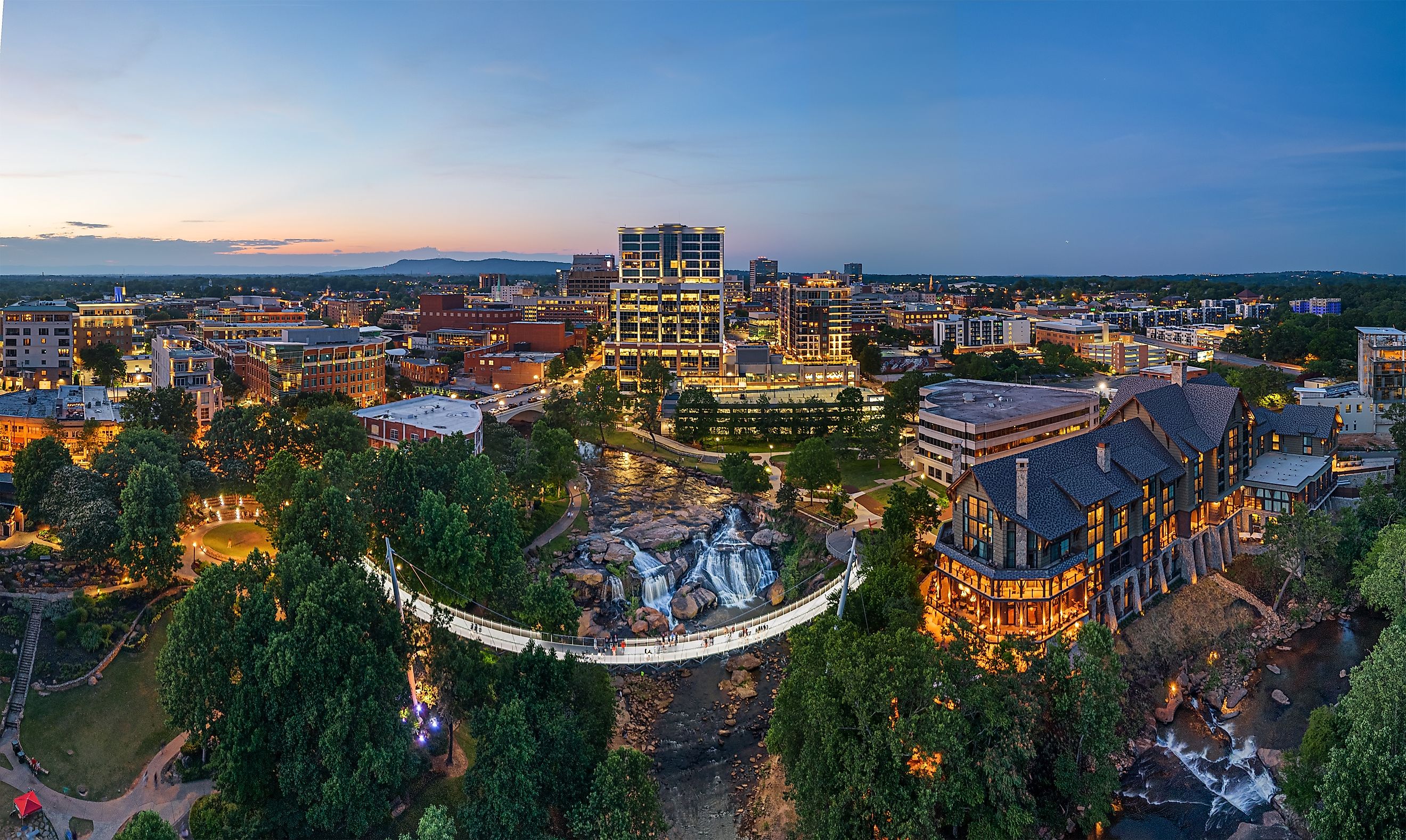 Greenville, South Carolina at Falls Park on Reedy Creek at dusk.