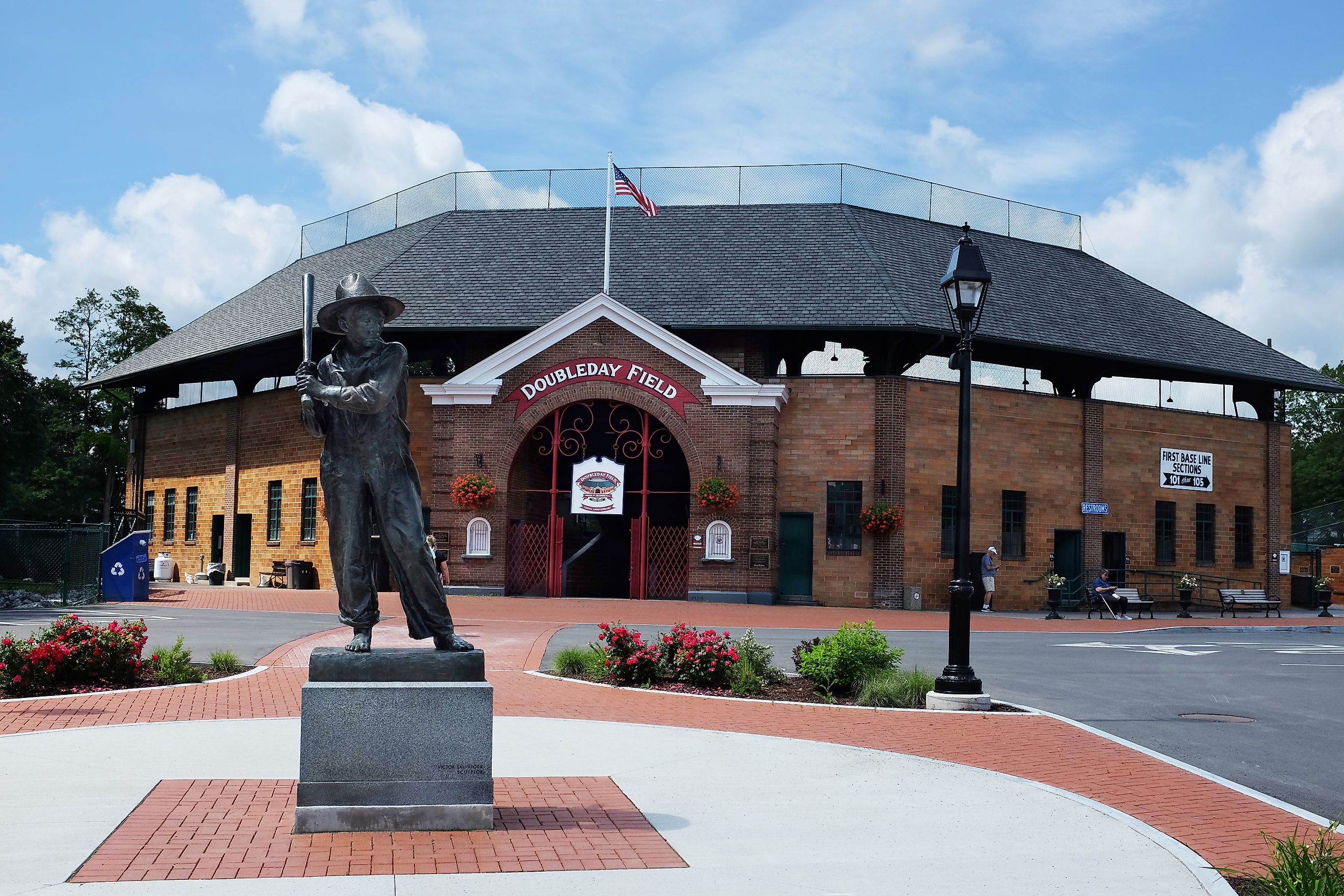 The Sandlot Kid statue at the entrance to Doubleday Field. Editorial credit: Steve Cukrov / Shutterstock.com