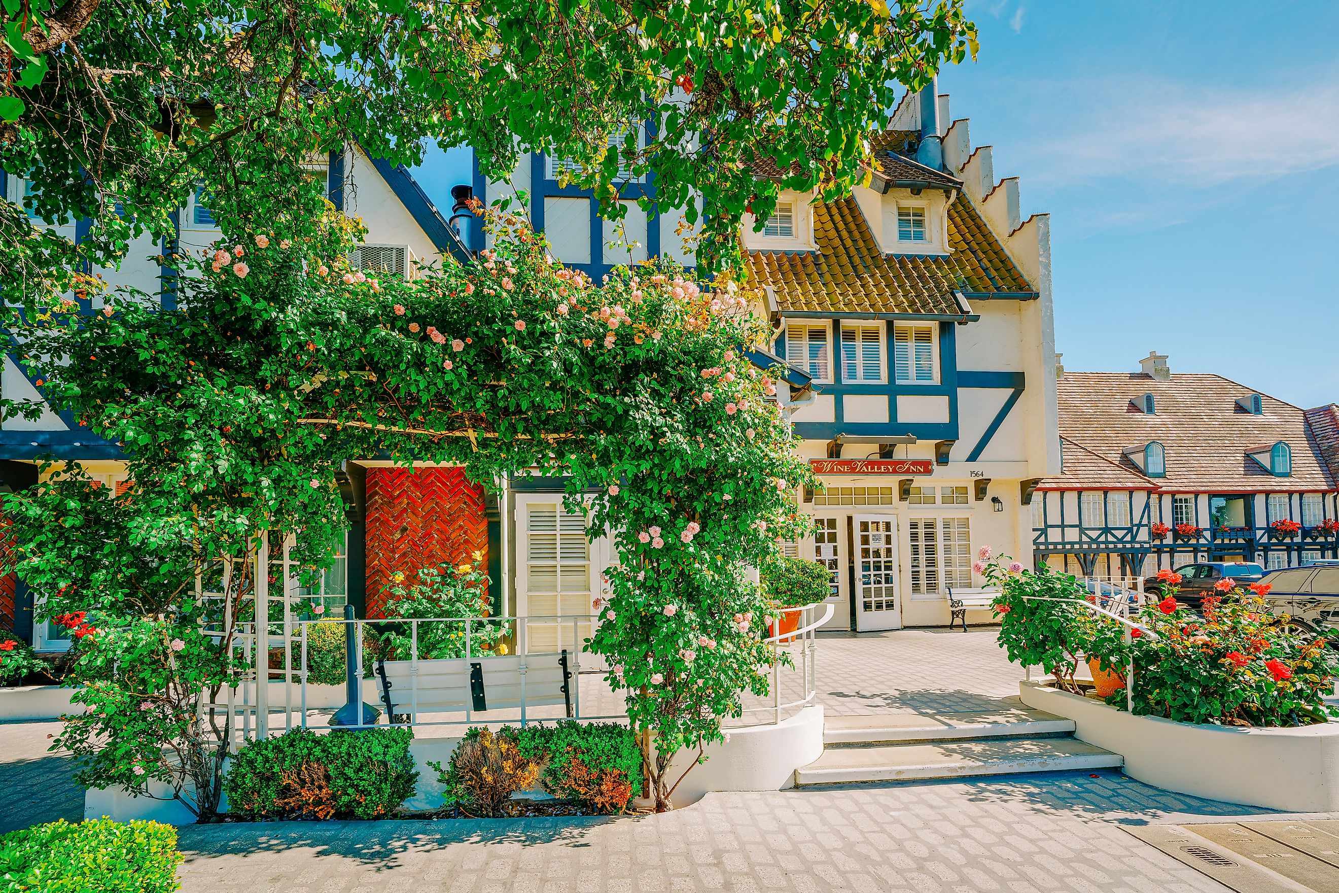 Solvang, California, USA - May 29, 2021 Wine Valley Inn hotel and street view, Solvang, Santa Barbara County, California. Editorial credit: HannaTor / Shutterstock.com