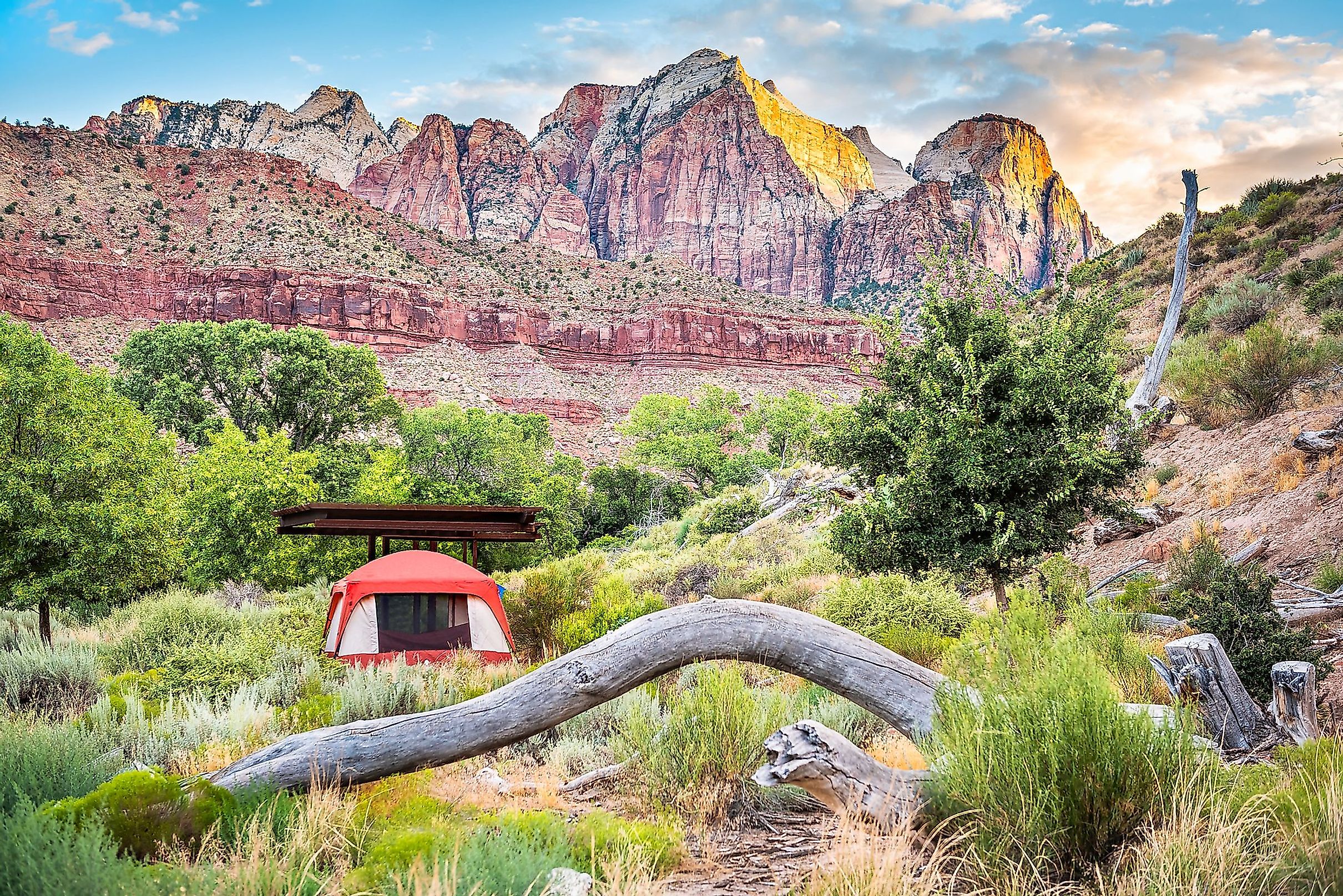 Zion National Park in Utah with tent camp site at Watchman Campground by rock