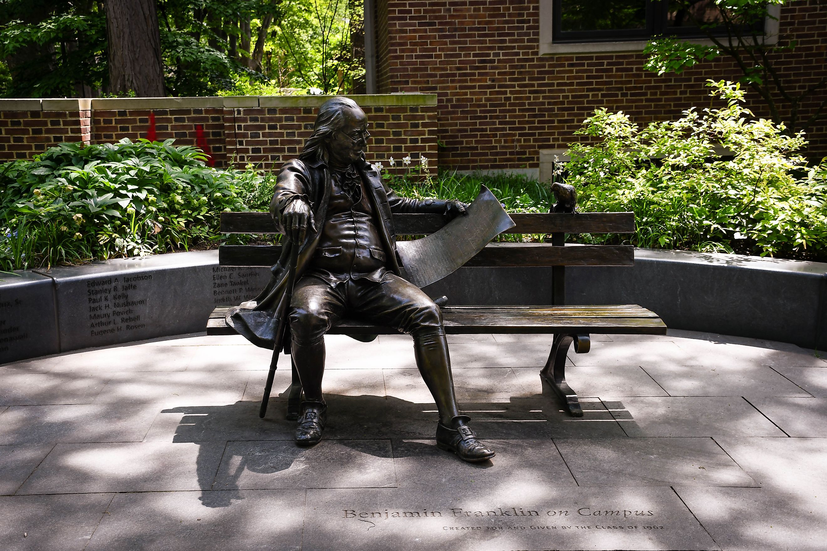 The Benjamin Franklin statue on a beach on Locust Walk at the University of Pennsylvania. Editorial credit: Sophia Zengierski / Shutterstock.com