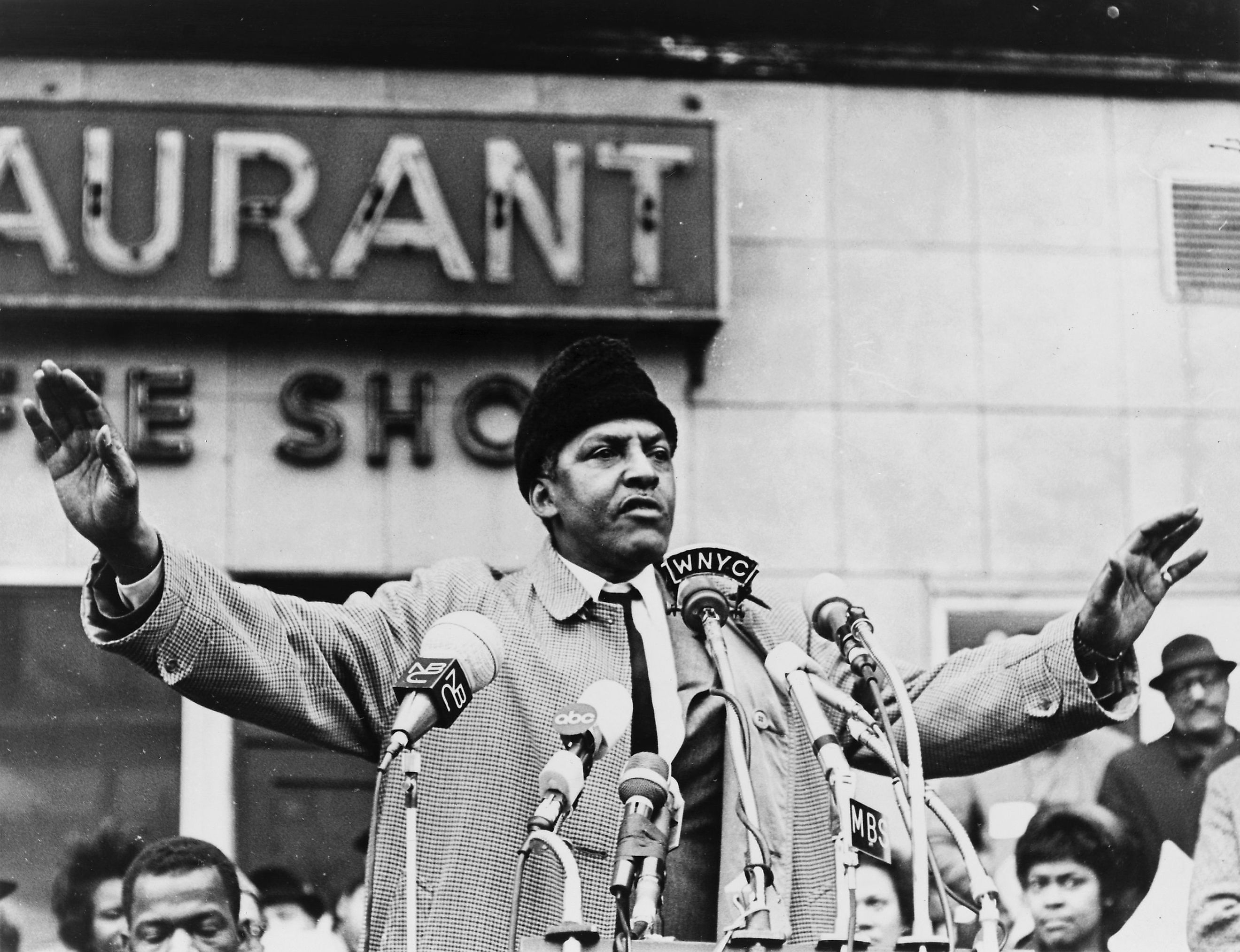 Bayard Rustin, half-length portrait, facing front, microphones in foreground / World Telegram & Sun photo by Stanley Wolfson. Editorial credit: New York World-Telegram and the Sun staff photographer: Wolfson, Stanley, photographer., Public domain, via Wik