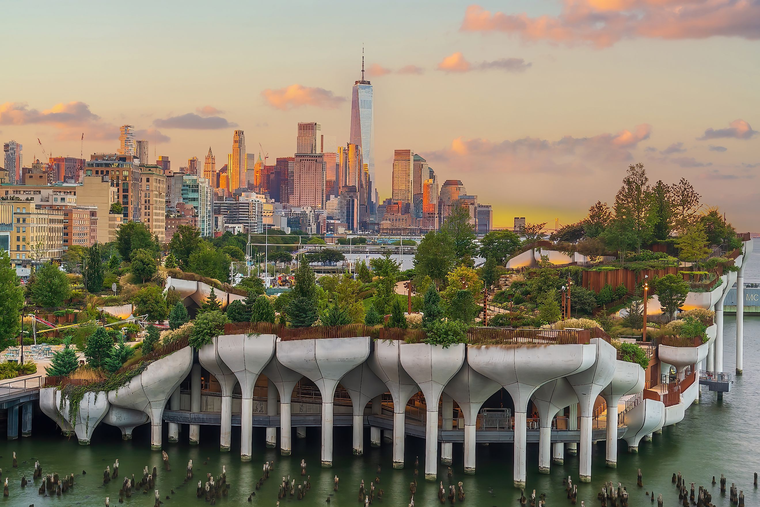 Cityscape of downtown Manhattan skyline with the Little Island Public Park in New York City at sunrise