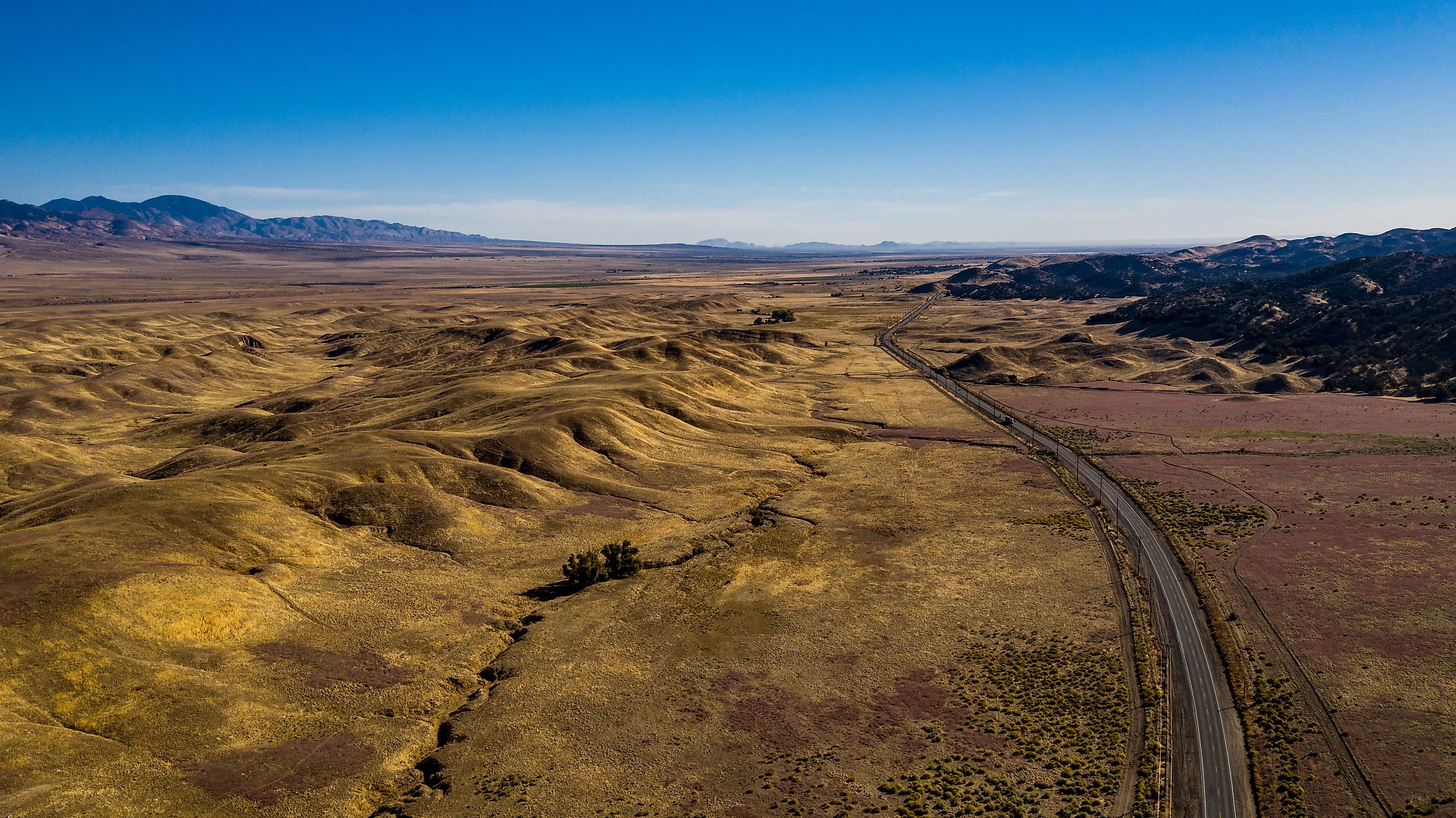 Aerial view of the golden hills along California Highway 138 near Quail Lake and San Andreas Fault